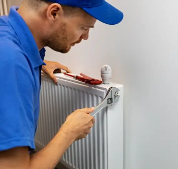Radiator maintenance service in London by WeFixPlumbing, ensuring optimal performance and longevity of heating systems. Skilled technicians performing thorough inspections and necessary repairs to keep radiators running smoothly.