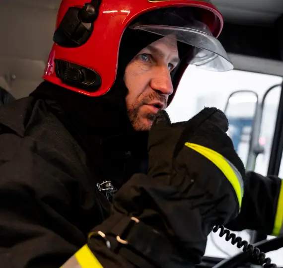Plumber using a plunger to address an overflow issue in a bathroom, representing overflows emergency service in London by We Fix Plumbing London.