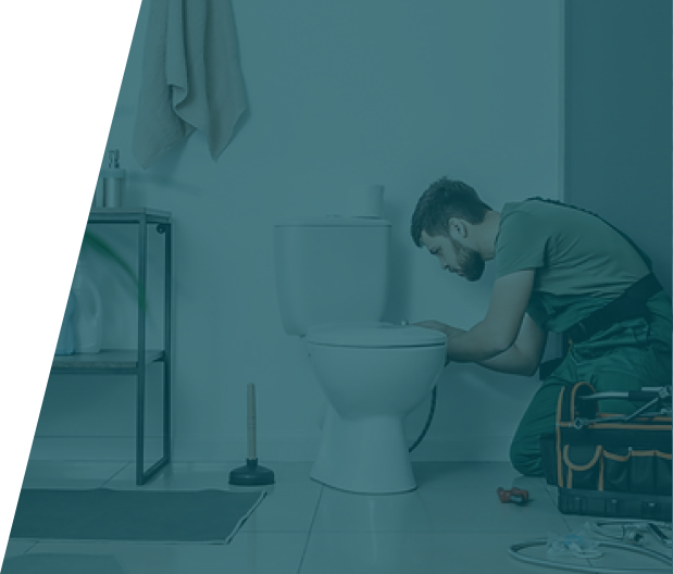 Group 36 (24) Skilled plumber performing toilet repairs or installations. Trust We Fix Plumbing for expert service in London.