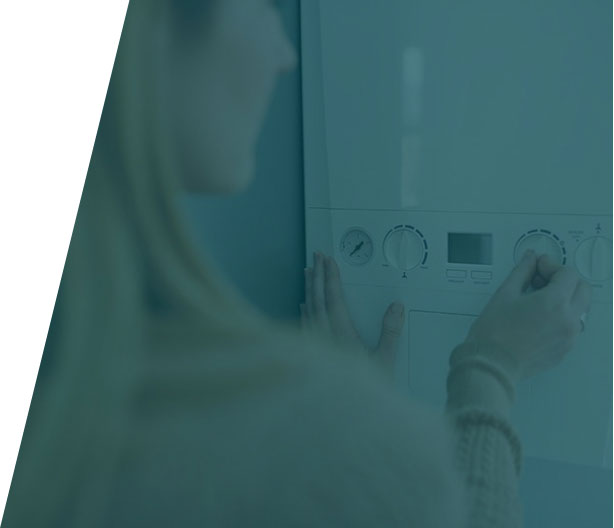 Group-36-(38) Plumber installing a high-efficiency boiler, highlighting boiler installation service in London by We Fix Plumbing London.