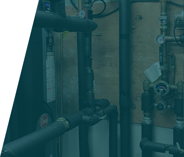 Group 36 (6) Plumber installing a booster pump for a residential water system, showcasing pumps installation service in London by We Fix Plumbing London.