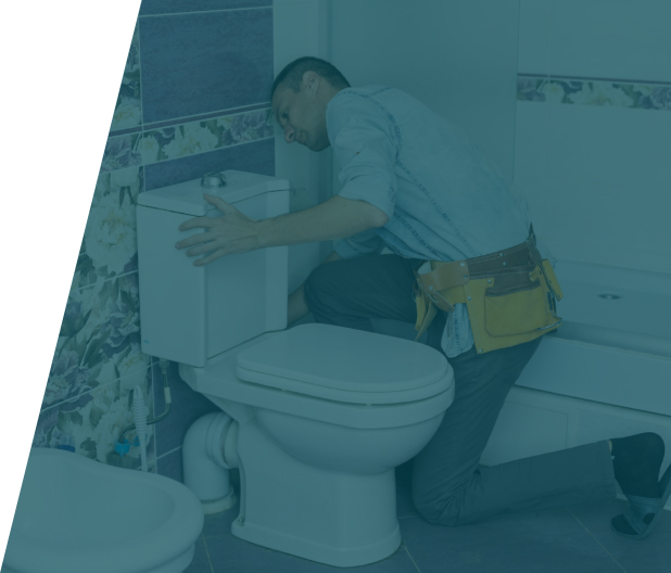 Group 37 (13) Plumber adjusting a bidet fixture, showcasing bidet installation and repair service in London by We Fix Plumbing London.