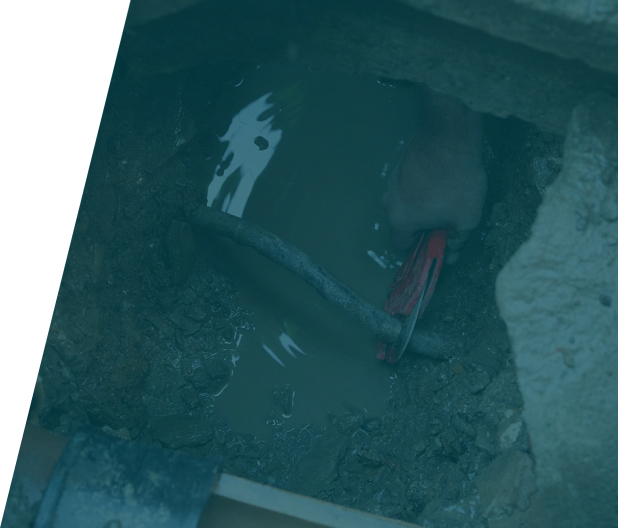 Plumber working on lead pipe replacement in a residential home, representing lead pipe replacement service in London by We Fix Plumbing London.
