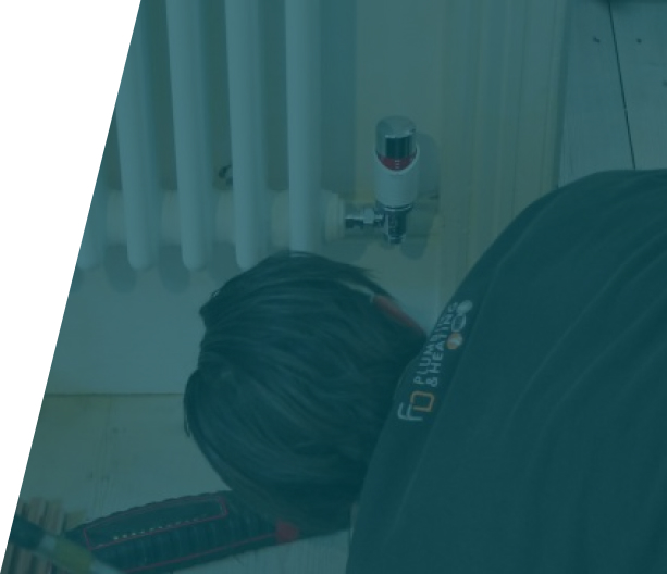 A team of experienced technicians from WeFixPlumbing, London, collaborating on radiator installation projects. Their expertise ensures top-notch heating solutions for customers across the city.