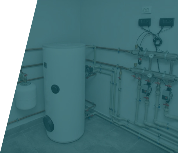 Group 39 (25) Experienced plumber examining vented and unvented cylinders. Trust We Fix Plumbing for expert service in London.