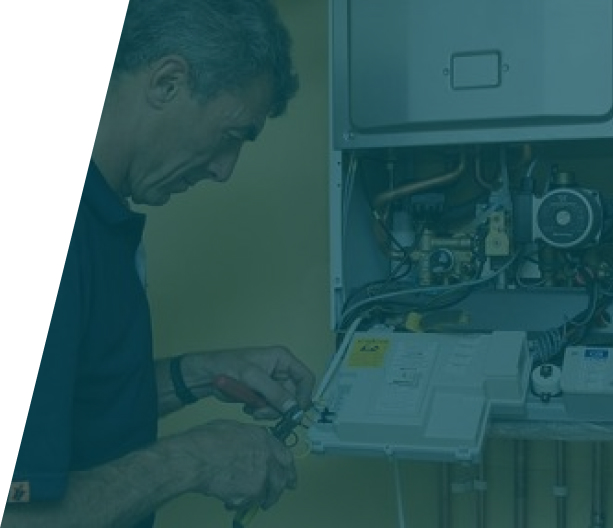 Efficient central heating installation team at work in a London home.