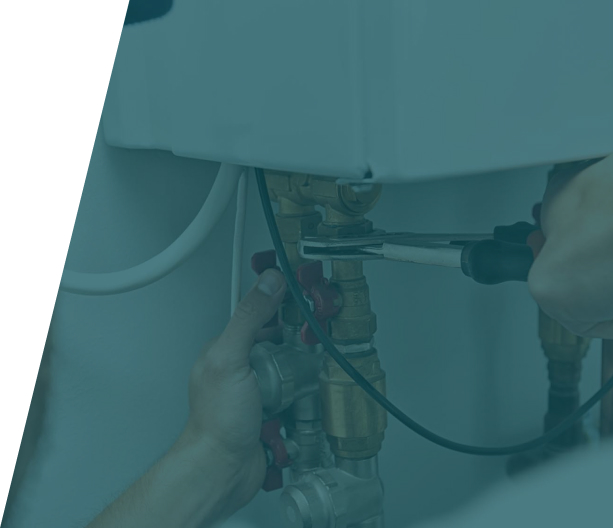 Team of skilled technicians performing a central heating installation in a London property.