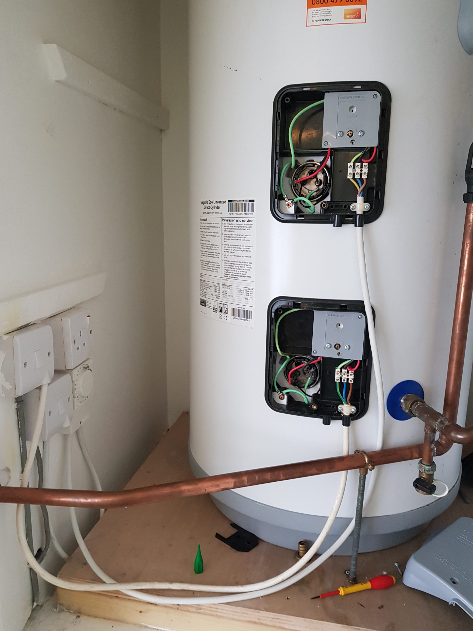 immersion-heater-2-scaled Image of an immersion heater being repaired, representing immersion heater service in London.