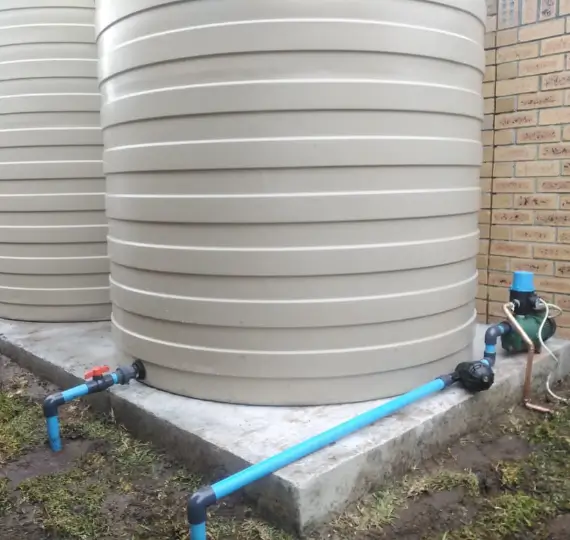 tanks1 Expert technician installing water tanks. Trust We Fix Plumbing for professional water tank installation service in London.
